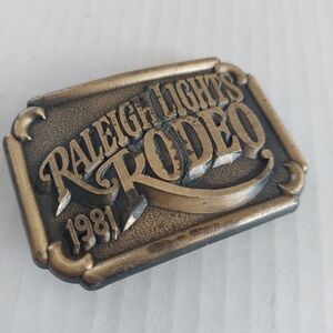 Vintage 1981 Raleigh Lights Rodeo Belt Buckle Brass